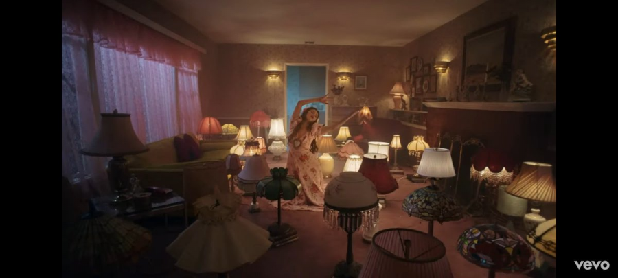 A scene from the video to De Una Vez, which pays homage to Frida Kahlo and other aspects of Mexican culture.