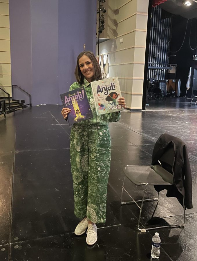Sheetal Sheth displays her two childrens books--Always Anjali and Bravo, Anjali! in the EHS auditorium recently.  Both books focus on the experiences of a young Indian-American girl named Anjali, and draw on experiences from Sheths own childhood.