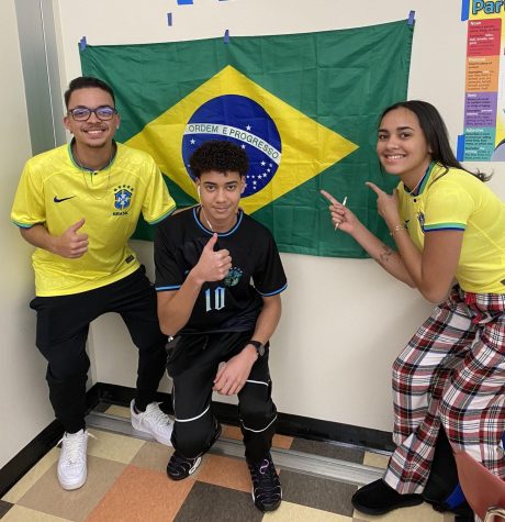 Many Brazilian students have been very excited to support their countrys team, including, from left, Henrique, Rian and Adalmita in EL teacher Christopher Coughlins period 2 class.