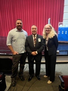 Law teachers Robert LeGrow (left) and Carolyn MacWilliam (right) with Chief Justice Roberto Ronquillo Jr. (middle)