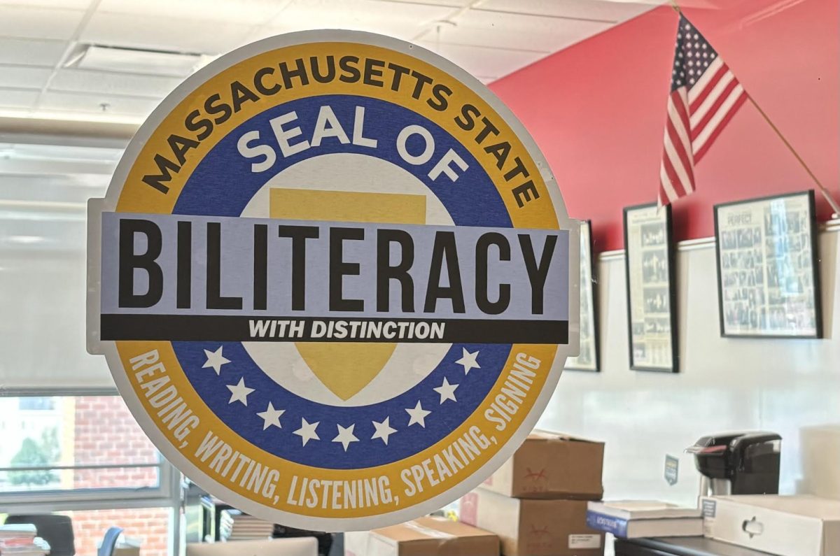 Outside of World Languages Department Head Andrea Tringalis office on the third floor, fliers and decals advertise the advantages of earning the coveted Seal of Biliteracy, especially since the school has so many students eligible to take the test.