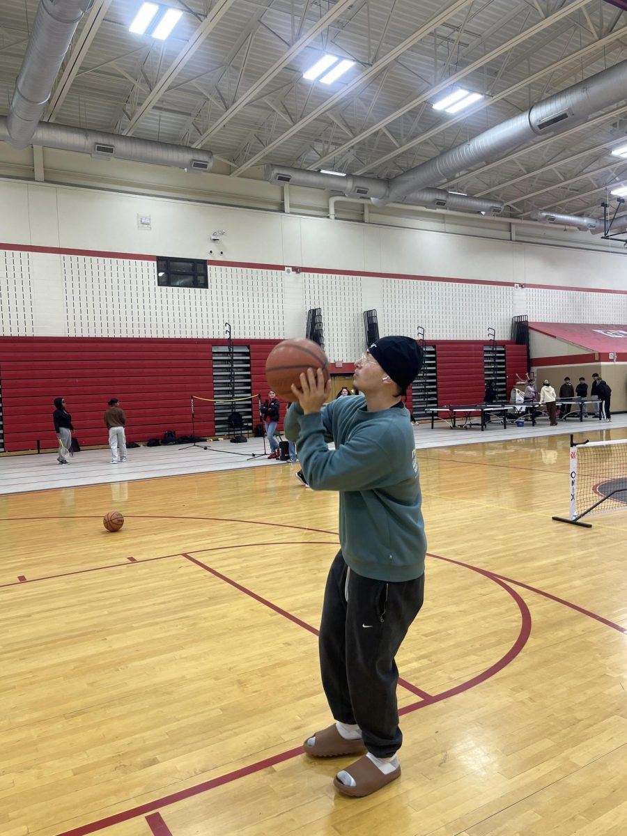 Senior Ronald Portillo practices his form in the gym