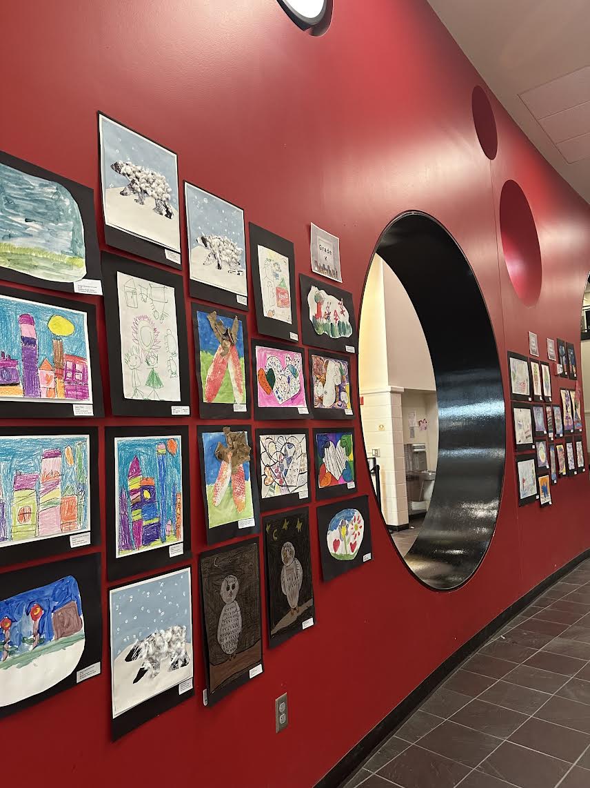 The front entryway hall featured vibrant art from elementary school students