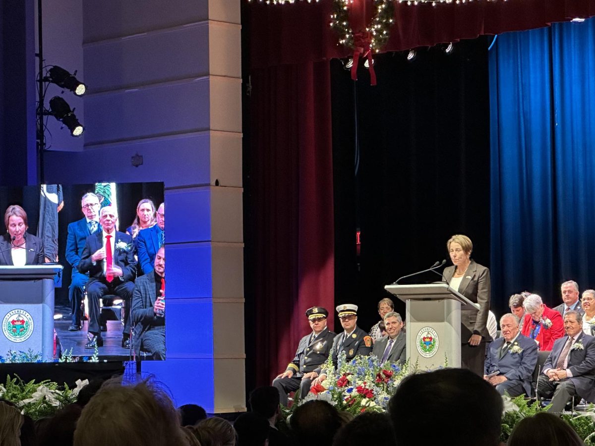 Governor Maura Healey making a speech in the EHS auditorium. 