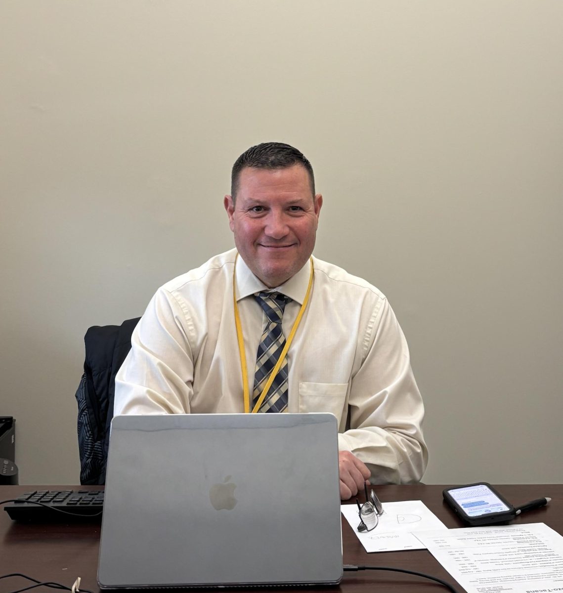 Whether it's on the field or in his office, DiLoreto brings his all to a job he loves.