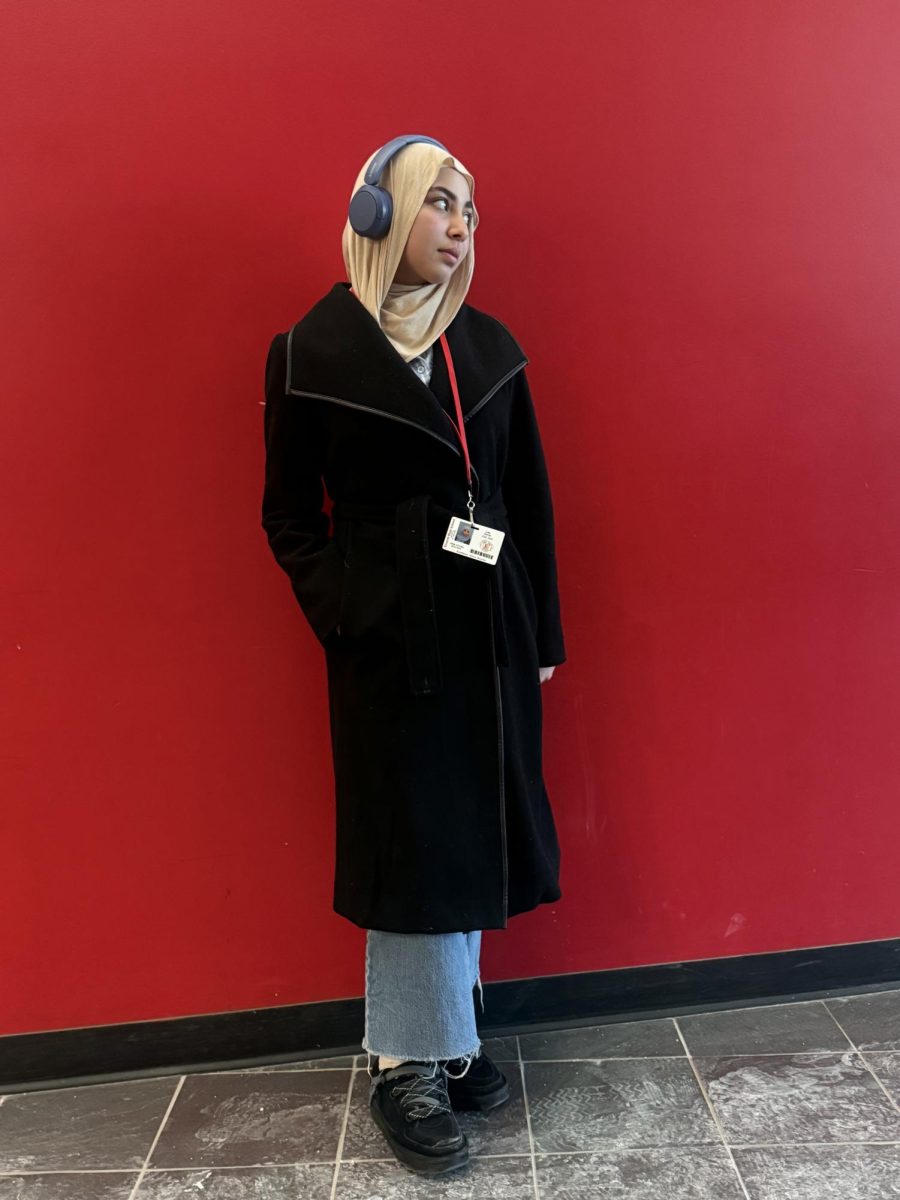 Freshman Lina Serrar with her elegant Amazon coat.