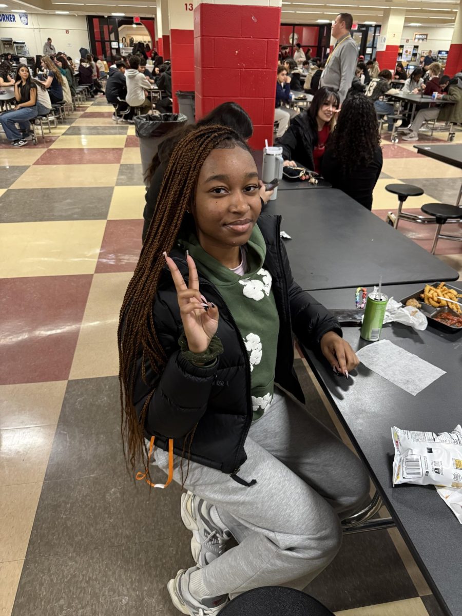 Senior Julissa Dor wearing North Face jacket 