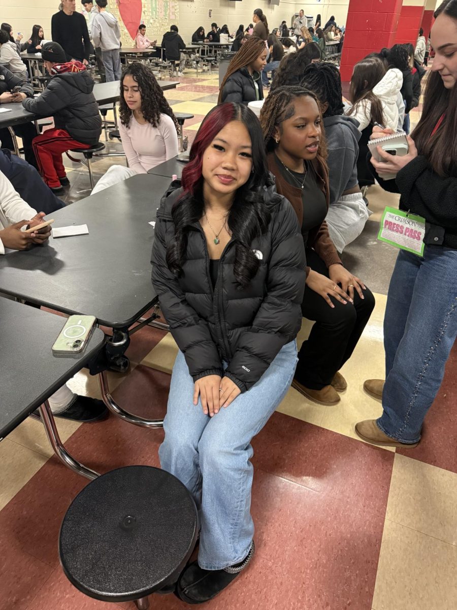 Layla Ho wearing a North Face jacket and black Uggs 