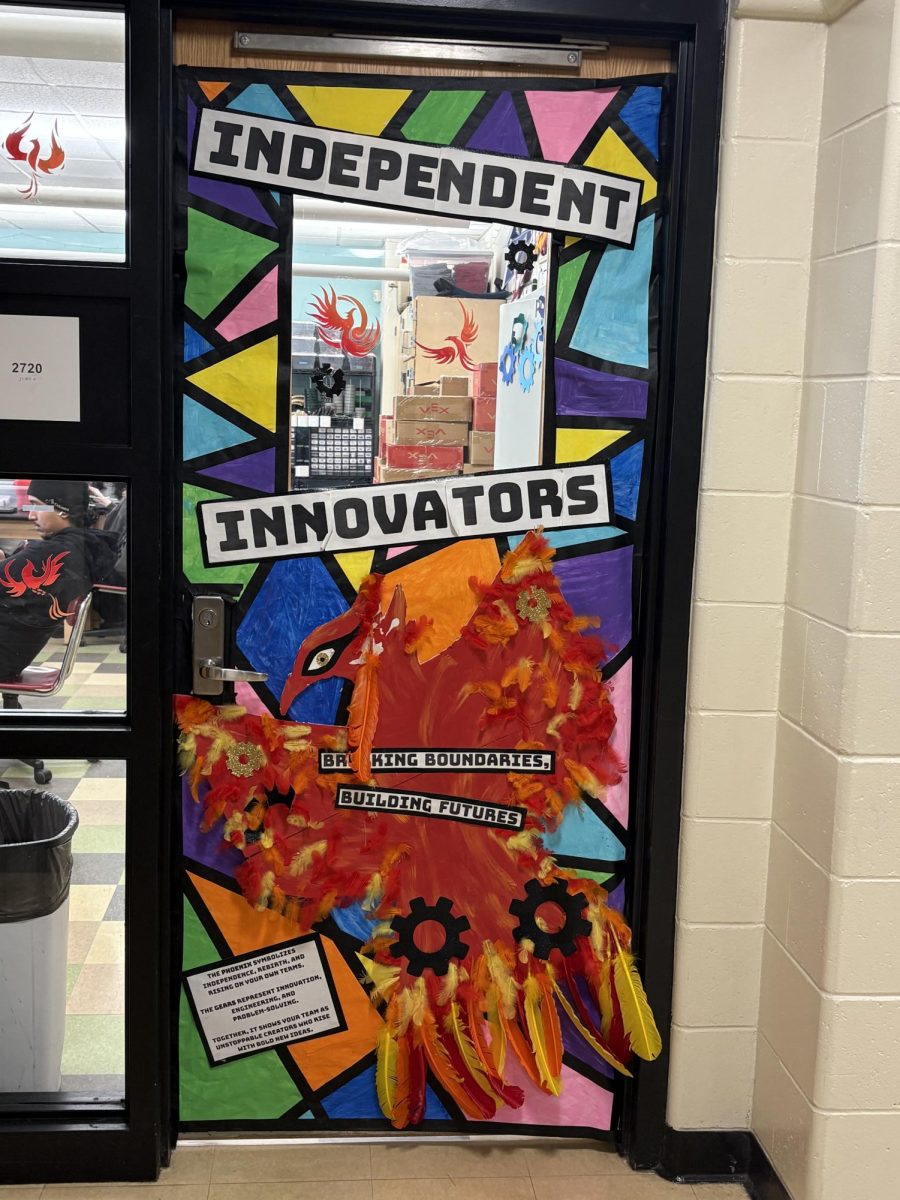 For innovation, room 2720 created a very colorful door with a phoenix as the mascot. The slogan is "Breaking boundaries, building futures".