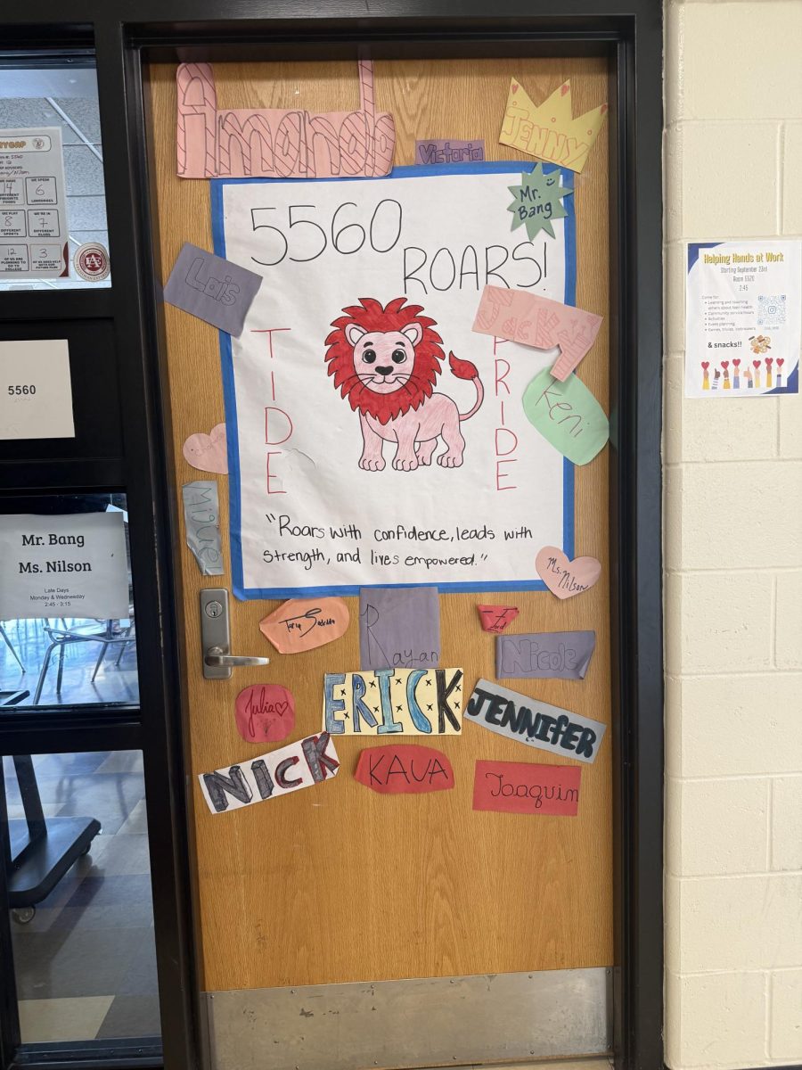 For empowerment, Room 5560 created a cute lion image and included each member of the homeroom on the door. Their slogan was "Roars with confidence, leads with strength, and lives empowered.