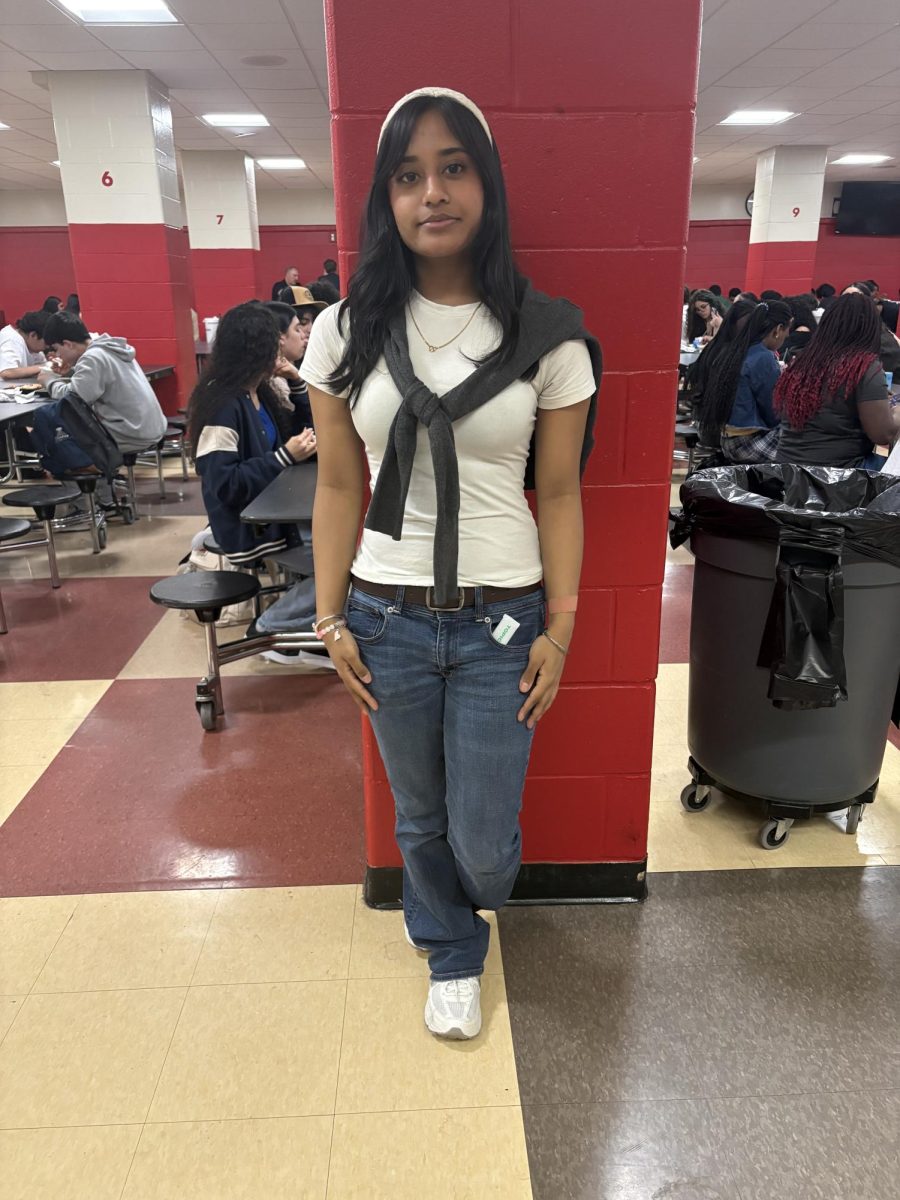 Sophomore Jane Maharjan poses in her country club themed outfit.