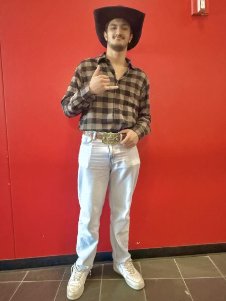 Senior Alex DeCastro dressed like a true country cowboy for Spring Spirit Week’s Country vs. Country Club Day 