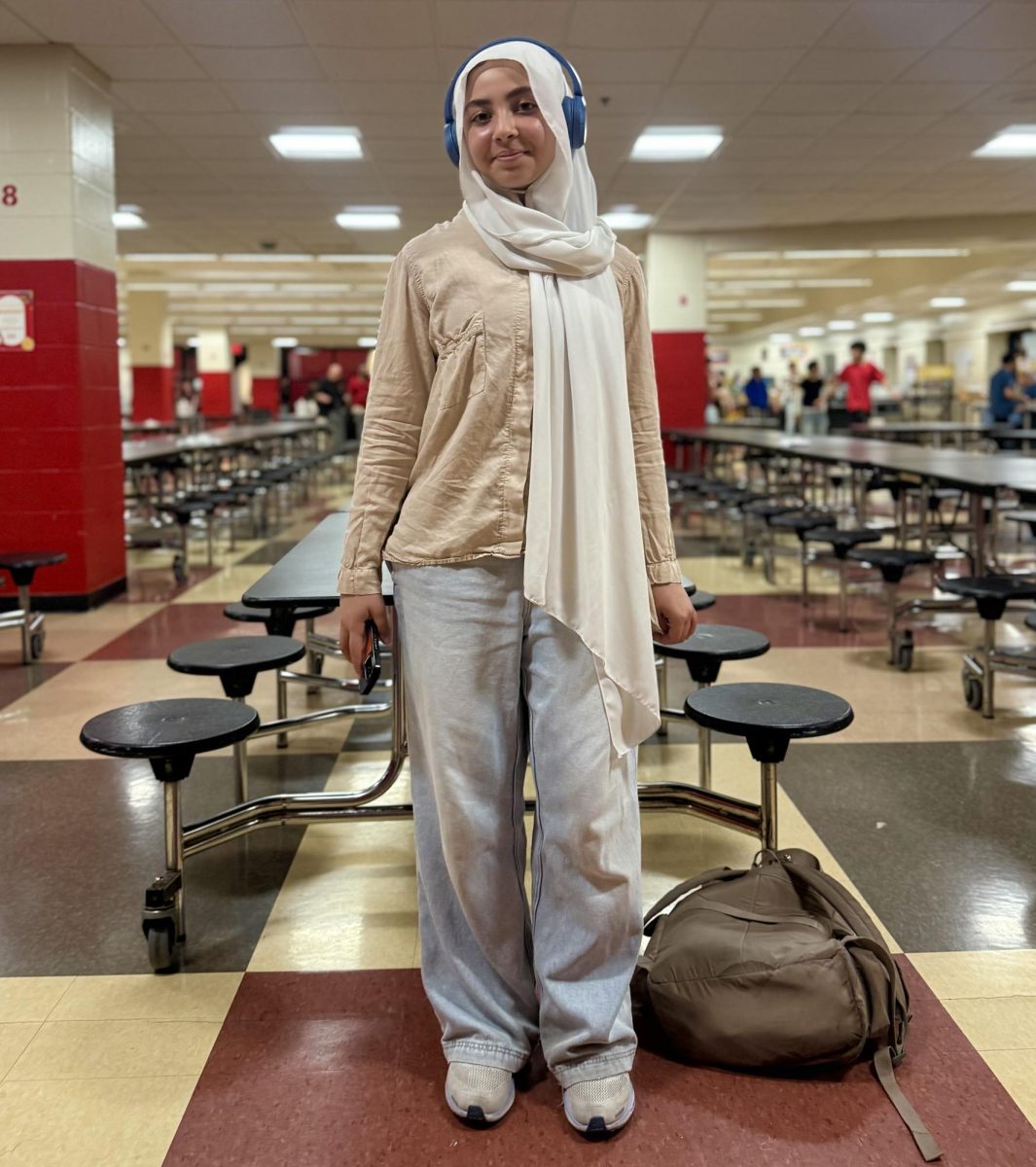Freshman Lina Serrar wearing bright light colors to welcome the summer warmth