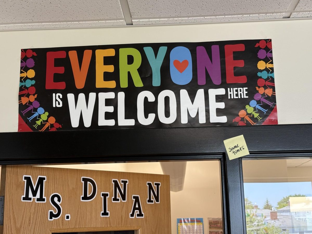 Rainbow welcome sign.
